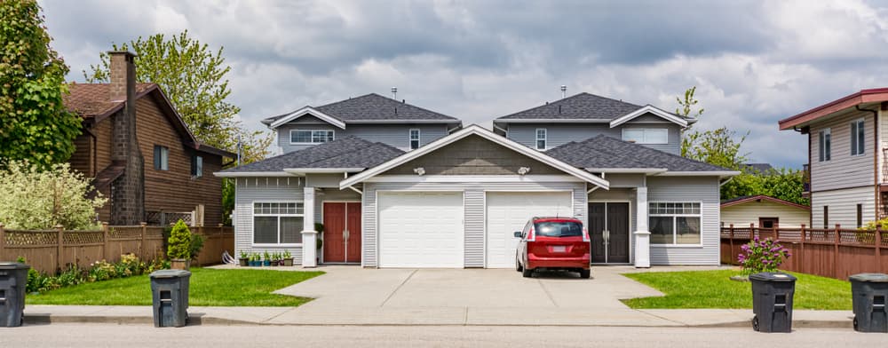 residential duplex townhouse red car parked